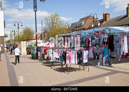 Market stall selling clothing in the Hertfordshire town of Hoddesdon Stock Photo