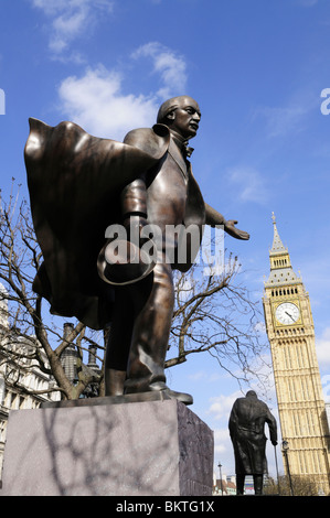 Statues of David Lloyd George and Sir Winston Churchill with Big Ben, Parliament Square, Westminster, London, England, UK Stock Photo