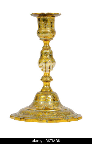 Antique ornate brass candlestick holder, isolated against white background Stock Photo