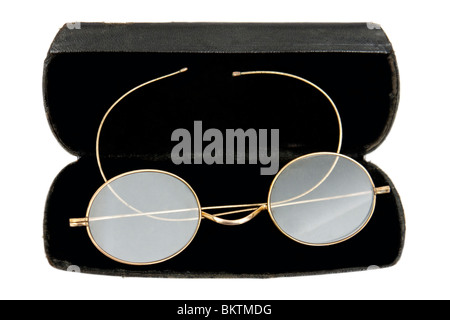 Antique Edwardian 18ct Gold spectacles in case, isolated on white background Stock Photo