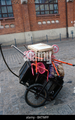 Krakow, April 2010 -- Hand cart on the sidewalk in the Kazimierz district of Kraków, Poland. Stock Photo