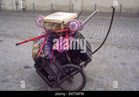 Krakow, April 2010 -- Hand cart on the sidewalk in the Kazimierz district of Kraków, Poland. Stock Photo