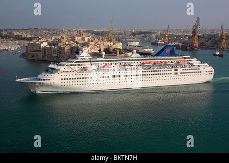 Mediterranean holidays. The cruise ship Louis Majesty departing from Malta's Grand Harbour Stock Photo