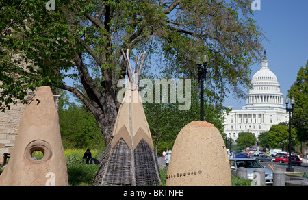 Washington, DC - Teepees and an earthen oven on the grounds of the National Museum of the American Indian. Stock Photo