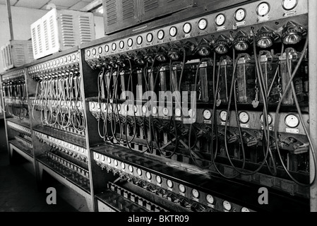 Coal miners lamp batteries charging in the lamproom at Merthyr Vale Colliery Mid Glamorgan South Wales Valleys UK Stock Photo