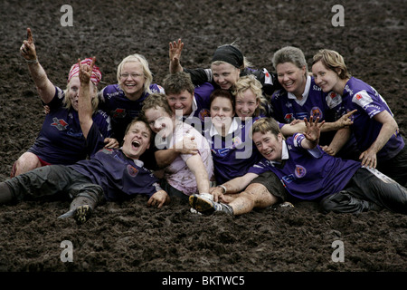 SWAMP SOCCER, WOMENS CHAMPIONS, 2008: FC Stray Cats celebrate beating STT Coca-Cola in the women's final of the 12th Annual Swamp Soccer World Cup Stock Photo