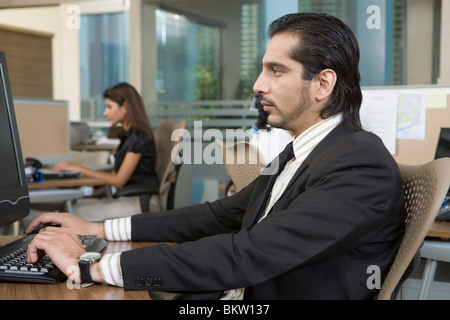 Business people working in office, side view Stock Photo