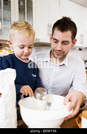 Father and son baking Stock Photo