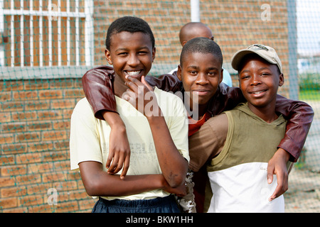 Friends at a rural soccer game Stock Photo