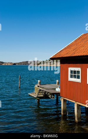 Boathouse by water