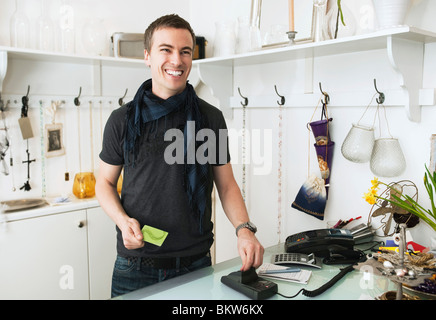 Man waiting for payment Stock Photo
