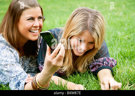 Friends in grass Stock Photo