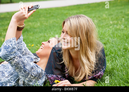 Girls in grass Stock Photo