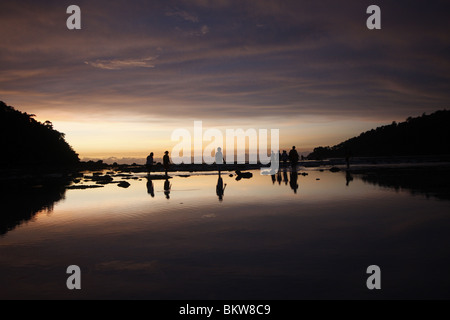 Sunset on Mai Nam Beach in Ko Surin marine national park, in Thailand. Stock Photo