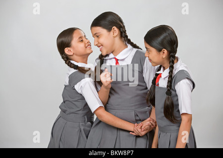 Three school girls having fun Stock Photo