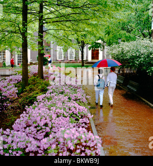 Students in rain, University of Pennsylvania, Ivy League school founded by Benjamin Franklin; Philadelphia; Pennsylvania; USA Stock Photo