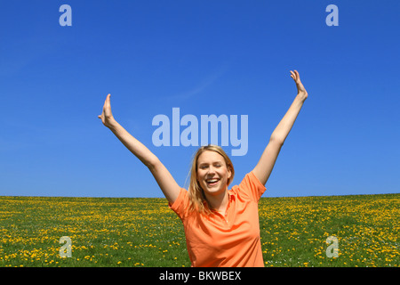 Happy young woman in spring Stock Photo