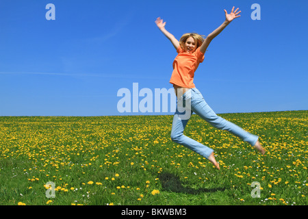 Happy young woman in spring Stock Photo