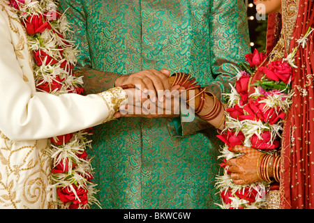 Indian man showing support to the newly wed couple Stock Photo