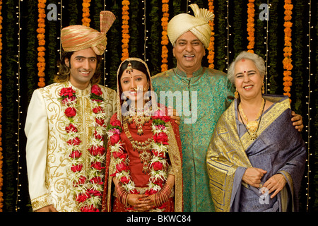 Indian couple with parents in a wedding Stock Photo