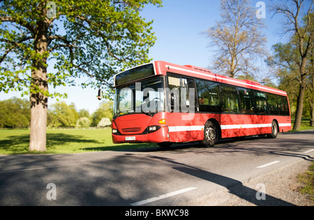 Bus standing by the verge Stock Photo
