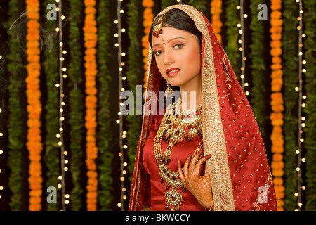 Beautiful indian bride looking at the camera Stock Photo