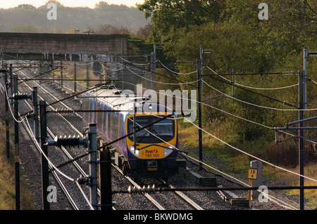 First TransPennine Express train on the West Coast Main Line in Lancashire, England Stock Photo