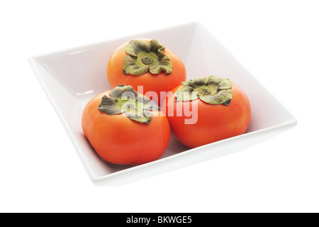 Persimmons in Bowl on White Background