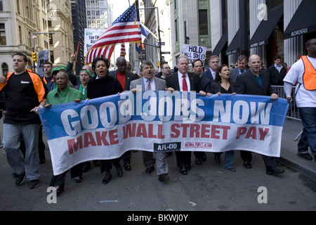 AFL-CIO president Richard Trumka (center, striped tie) leads a union march down Broadway to Wall Street, demanding good jobs Stock Photo