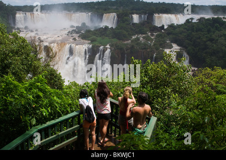 Tourists at Iguaçú Falls, one of the biggest falls in the world, Paraná state, Brazil Stock Photo