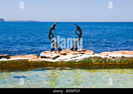 Sculptures at Fairy Bower pool, the 1st ocean baths north of Sydney Harbour Stock Photo