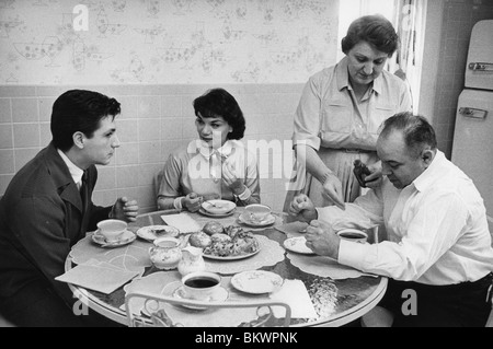 CONNIE FRANCIS: 1961 with parents George & Ida Franconera at their Bloomfield, New Jersey, home with pop arranger Tony Randazzo Stock Photo