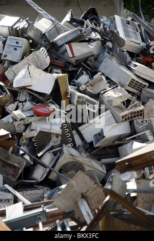 pile of old household appliances in a scrap yard Stock Photo