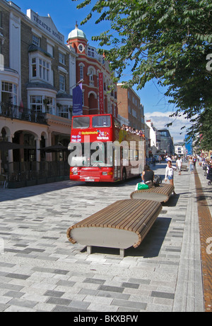 Open Top Sightseeing Bus outside The Theater Royal, in New Road, Brighton, East Sussex, England, UK, Great Britain Stock Photo