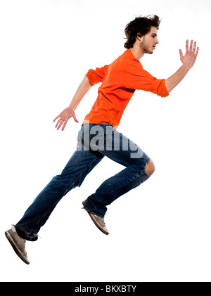 young running caucasian man portrait in studio on white background Stock Photo