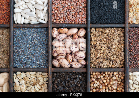 Selection of Vegetable and flower seeds in a wooden tray. Flat lay photography from above Stock Photo