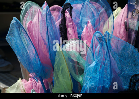 Colourful, childrens' fishing nets for a fun trip down to the stream or  seaside! Stock Photo - Alamy