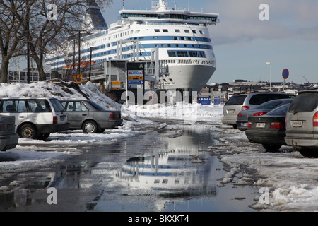 BALTIC FERRIES, WINTER, HELSINKI: A Silja Line ferry (Symphony) docks in Helsinki main harbour at the heart of the city in Winter Finland Stock Photo