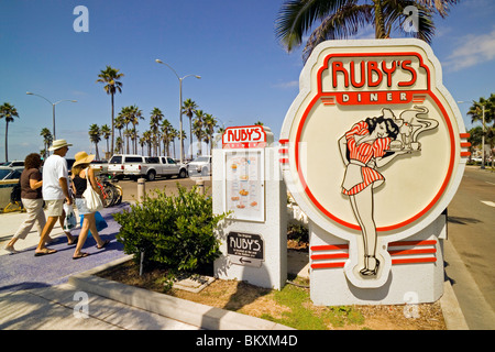 An illustrated sign and menu heralds the original Ruby's Diner that is nearby at the end of the Balboa Pier in Newport Beach, California, USA. Stock Photo