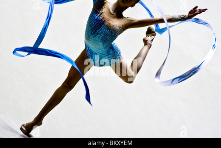 Gymnast performing individual ribbon dance Stock Photo