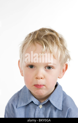 small boy making faces Stock Photo