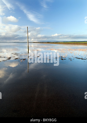 One of the Pilgrims Way Marker Posts on Lindisfarne Causeway Stock Photo