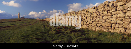 Light house and dry stone wall, Stock Photo