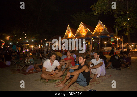 Young people at a Full Moon Party, Hat Rin Nok, Sunrise Beach, Ko Pha-Ngan, Thailand Stock Photo