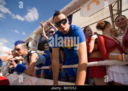 Dressed up young people on a Love Mobile near Quai Bridge, Street Parade (the most attended technoparade in Europe), Zurich, Can Stock Photo