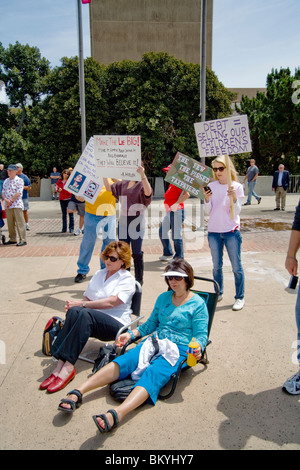 Anti-government protesters at a 'Tea Party' rally on April 15 (Tax Day) in Santa Ana, California. Note signs. Stock Photo