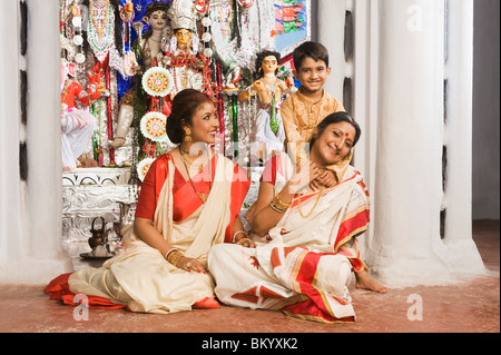 Family in a temple Stock Photo