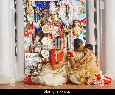 Family in a temple Stock Photo