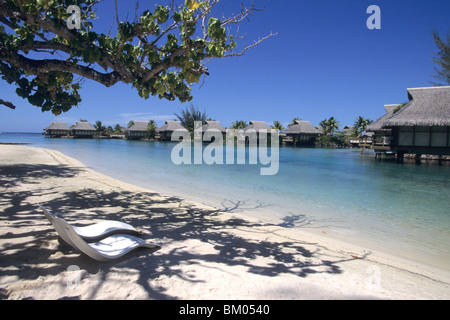 Beach Chairs & Overwater Bungalows, InterContinental Beachcomber Resort, Moorea, French Polynesia Stock Photo