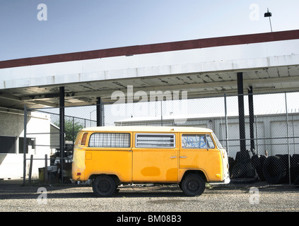 an abandoned VW bus at a deserted gas station in page arizona Stock Photo